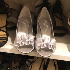Silver satin dress shoes by Nina
